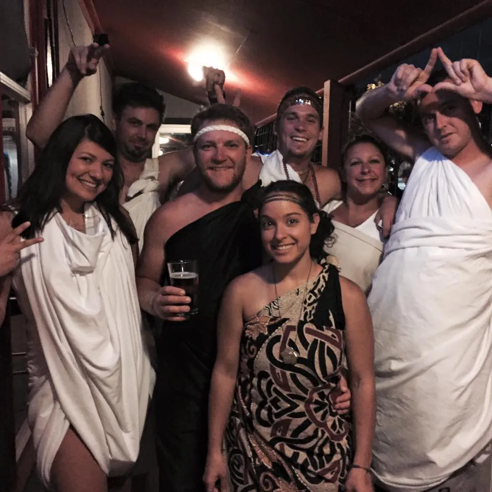Group in hand-made togas at the Club Rio fundraiser